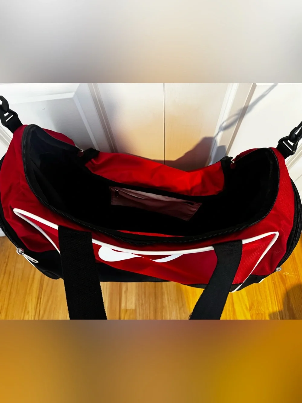 Nike Red and Black Sport Duffel with White Swoosh